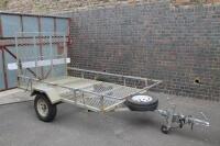 A metal framed golf buggy trailer