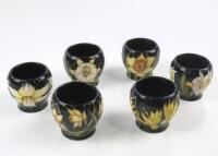 A set of six Moorcroft pottery daffodil egg cups