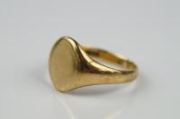 A plain 9ct gold signet ring