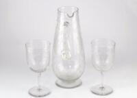 A late Victorian glass jug and goblet set