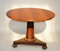 A early Victorian circular mahogany breakfast table