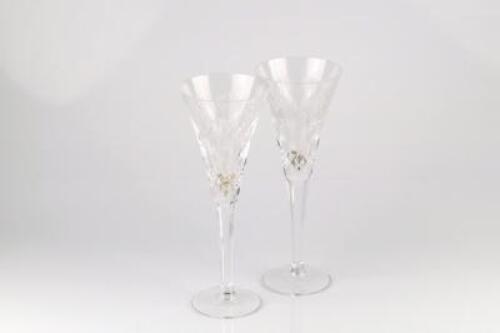 A pair of Waterford crystal millennium collection champagne flutes