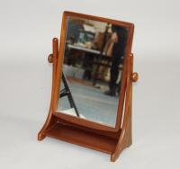 A retro style teak swing frame dressing table mirror