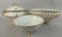 A 19thC armorial porcelain part dinner service