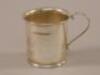 A 20thC plain silver christening mug