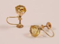 A pair of 9ct gold stone set earrings