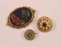 Three decorative brooches