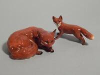 Two Beswick foxes