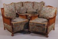 An early 20thC walnut bergere suite