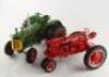 Two Franklin Mint diecast models of The Oliver Super 99 diesel tractor