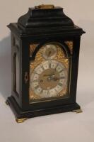 An ebonised double fusee mantel clock