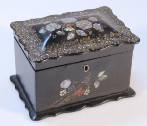 A Victorian black papier mache tea caddy