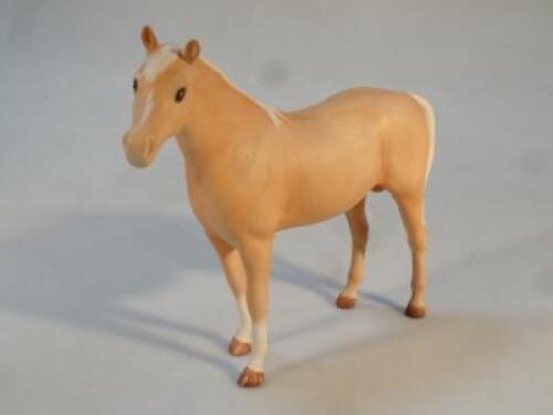 A Beswick model of a palomino horse