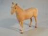 A Beswick model of a palomino horse