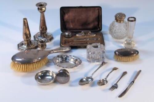 A collection of silver dressing table items