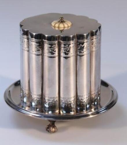 A silver plated biscuit barrel