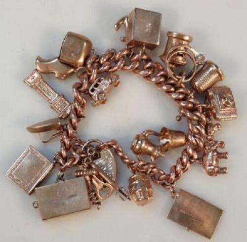 A 9ct gold charm bracelet with padlock clasp