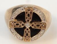 A 9ct gold and black onyx signet ring