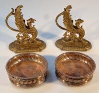 A pair of 19thC brass door stops