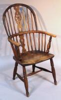 A 19thC ash and elm high back Windsor chair