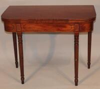 A 19thC mahogany fold over tea table