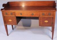 An Edwardian mahogany sideboard