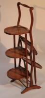 A mid-20thC mahogany six sectional cake stand