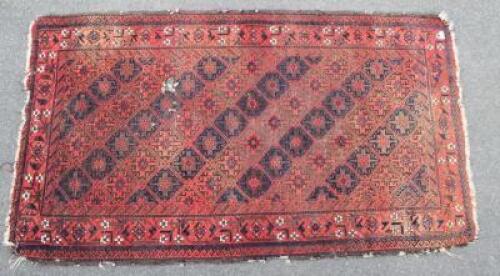 A Persian hearth rug