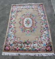 A machine woven hearth rug