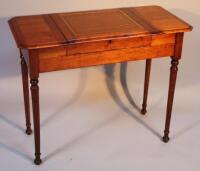 An Edwardian Britisher mahogany and satinwood desk