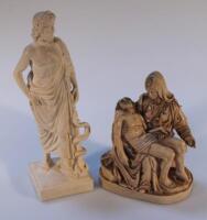 A resin figure of Christ and Mary Magdalene