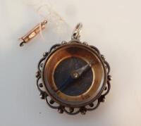 A bloodstone compass pendant