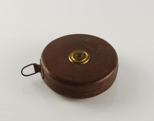 A vintage cricketers tape measure