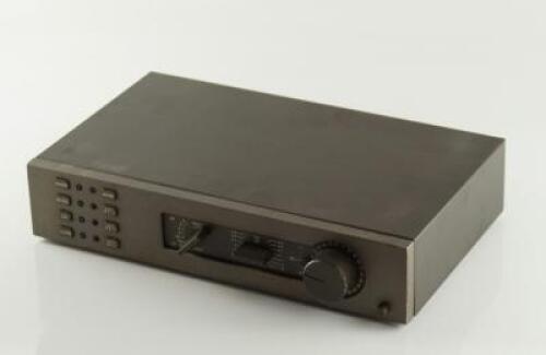 A 1980s QUAD FM4 radio tuner.