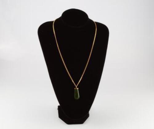 A 9ct gold pendant and chain