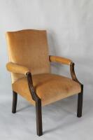 A quality reproduction mahogany framed open armed upholstered chair