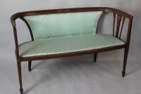 An Edwardian Sheraton style small inlaid mahogany framed settee