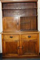 A medium oak dresser