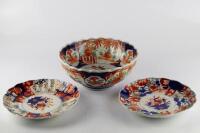 An Imari bowl and two Imari dishes