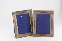 A pair of modern silver photograph frames