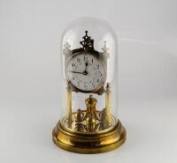 An early 20thC brass torsion clock