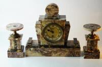 An Art Deco slate and marble clock garniture