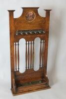 An early 20thC oak stick stand