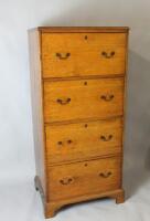 A Victorian oak tall chest of drawers