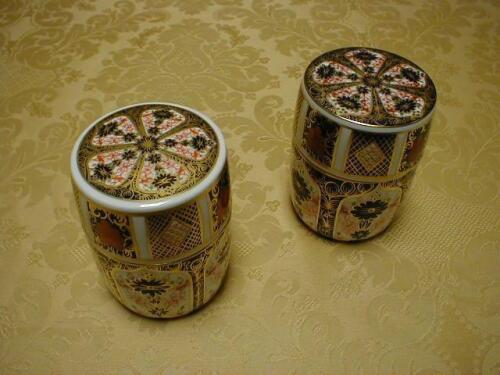 A matched pair of circular cannisters and covers