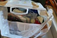 A large bag of wool and craft related items.