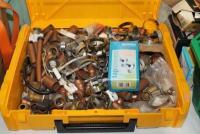 A large quantity of copper and brass plumbing components.