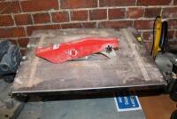 An Einhell 920NIRO tile cutter.