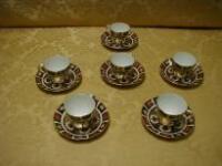 A set of 6 tea cups and saucers