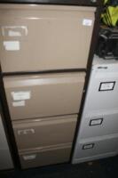 A beige and cream four drawer filing cabinet.